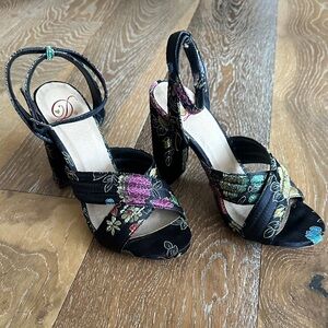 Never worn black floral ankle strap heels. Super cute! Size 6